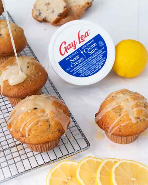 Lemon Muffin with a tub of Gay Lea Sour Cream